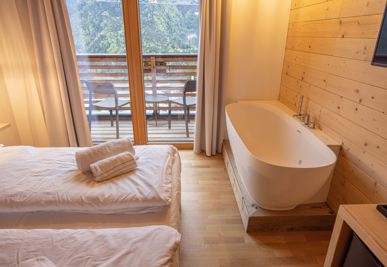 Hotel a Pieve di Cadore - B&B GIALLO - Camera Wellness Genzianella