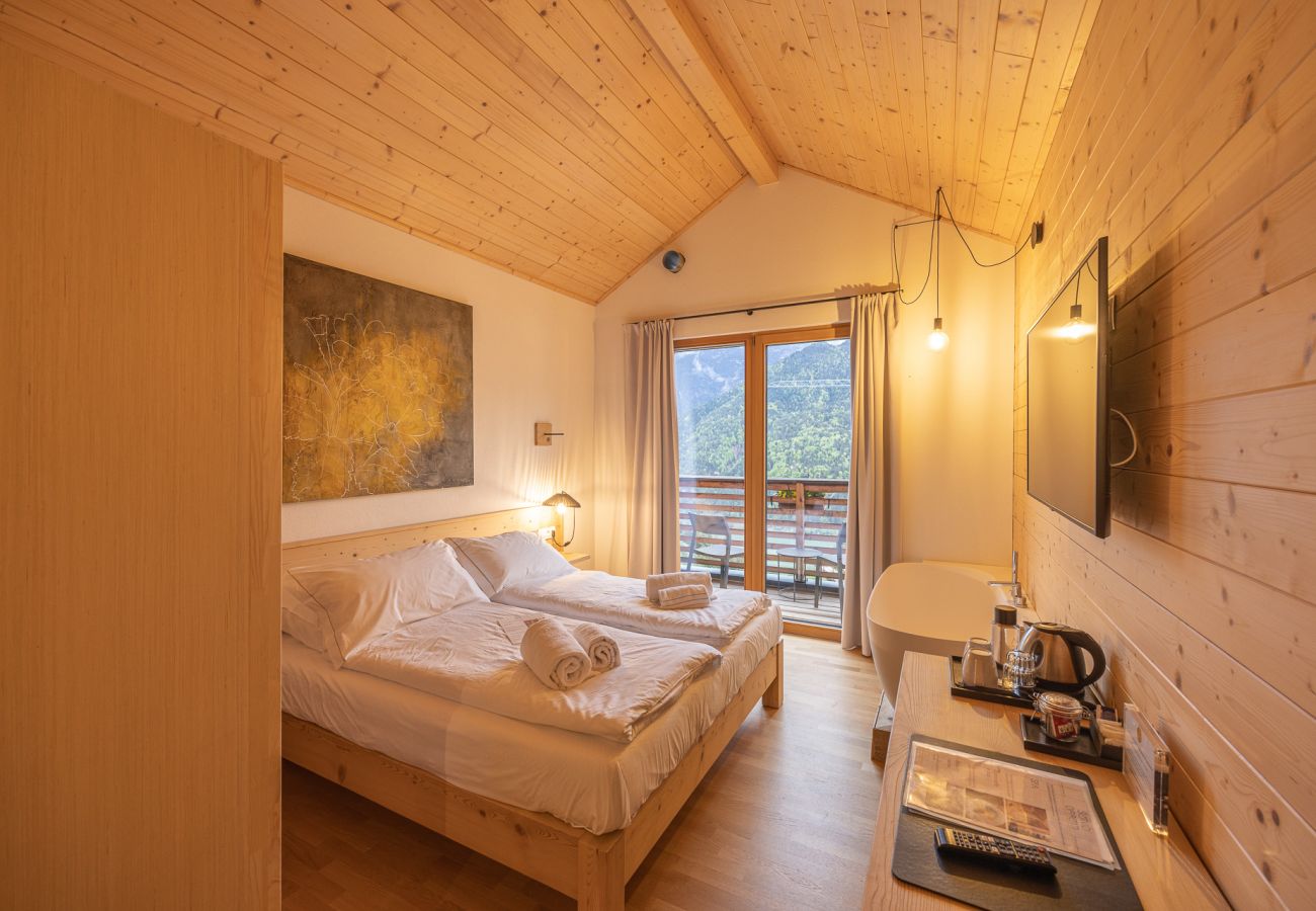 Hotel a Pieve di Cadore - B&B GIALLO - Camera Wellness Genzianella