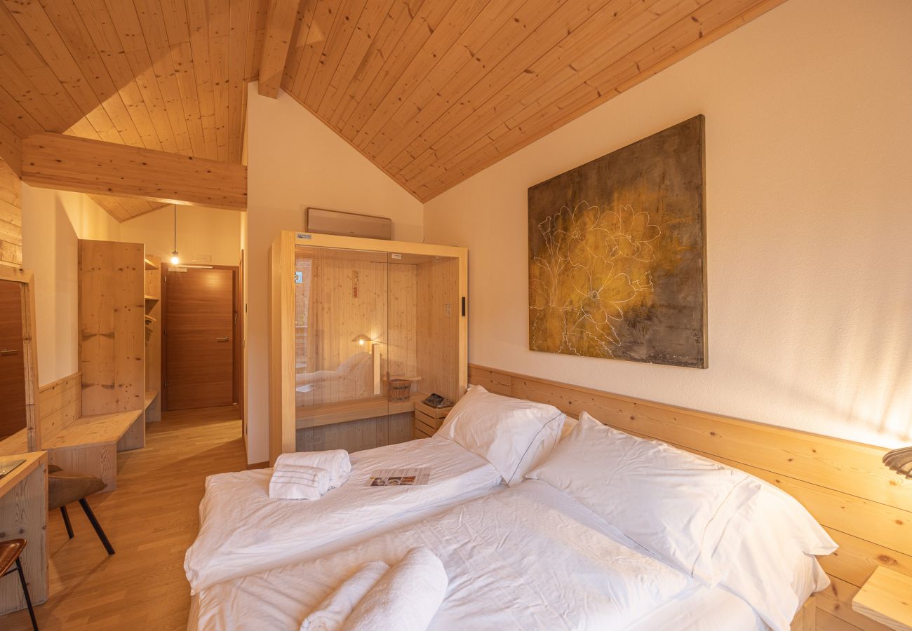 Hotel a Pieve di Cadore - B&B GIALLO - Camera Wellness Genzianella