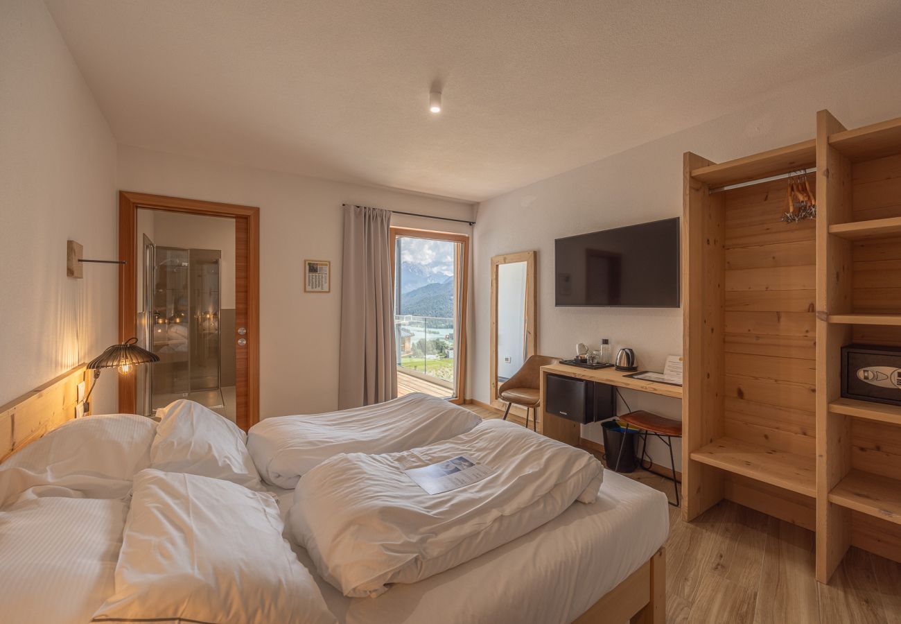 Affitto per camere a Pieve di Cadore - B&B GIALLO - Camera Menta con bagno per disabili