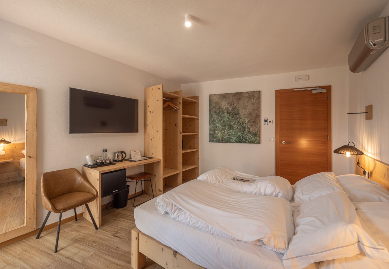 Affitto per camere a Pieve di Cadore - B&B GIALLO - Camera Menta con bagno per disabili