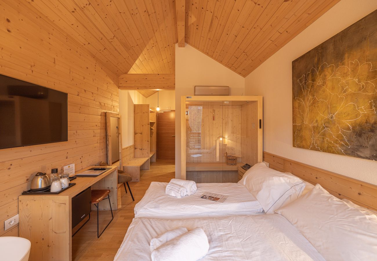 Hotel a Pieve di Cadore - B&B GIALLO - Camera Wellness Raponzolo