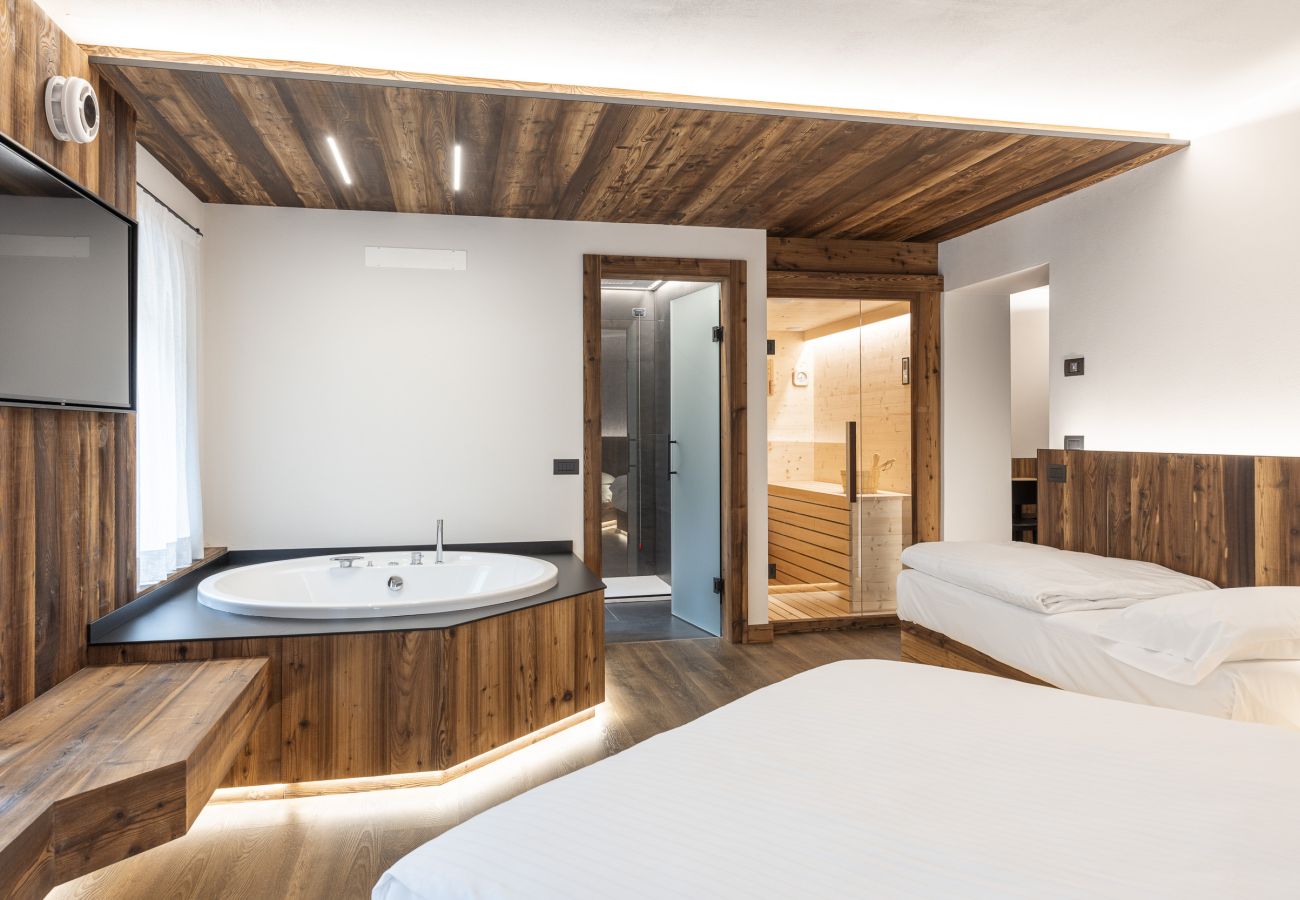 Appartamento a Auronzo di Cadore - Salvans Wellness - Camera Ametista