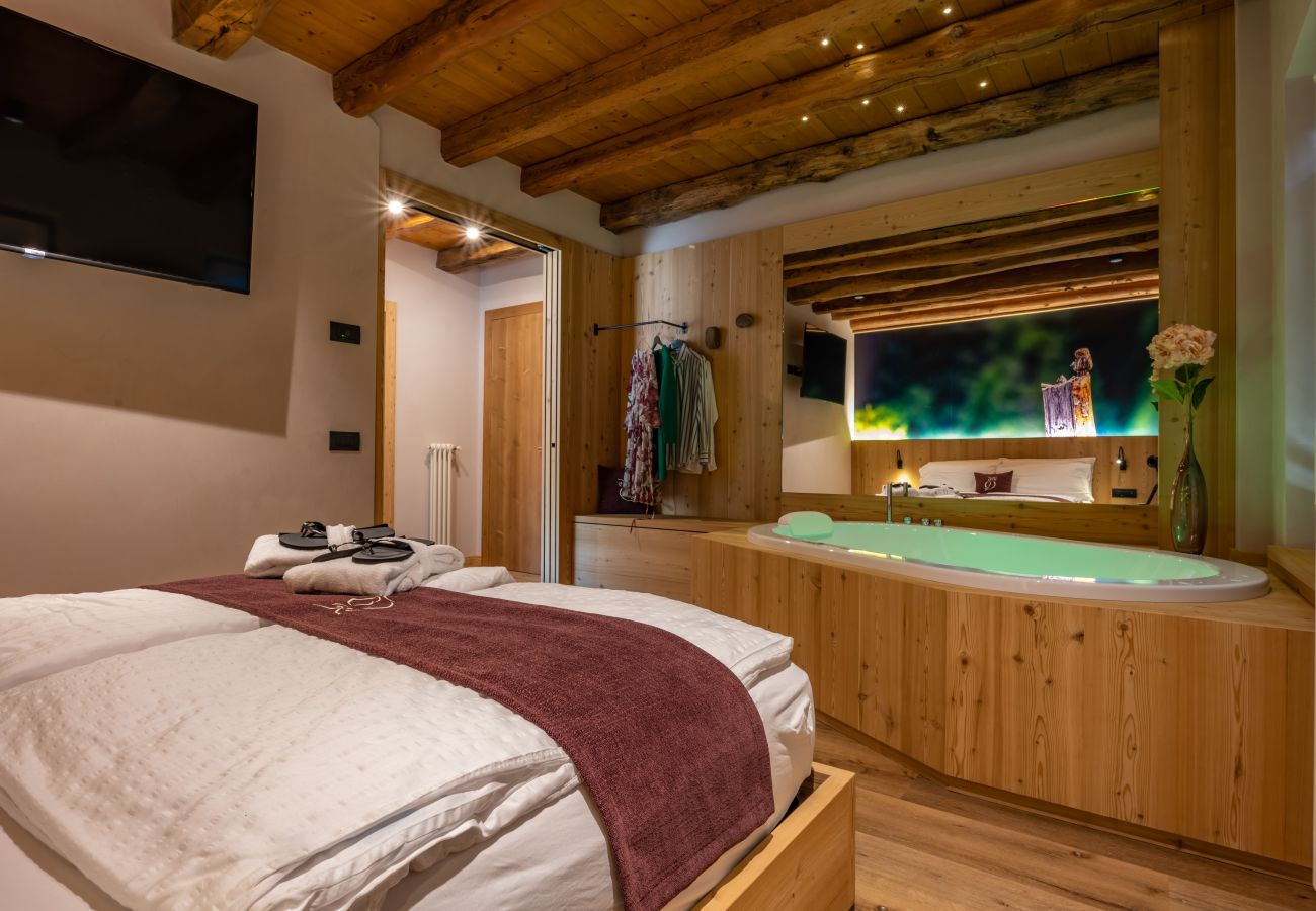 Zimmeranmietung in Lamosano -  TEVERONE SUITES & WELLNESS - Camera Civetta