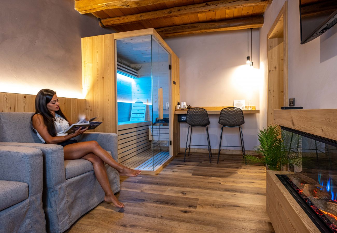Zimmeranmietung in Lamosano -  TEVERONE SUITES & WELLNESS - Camera Civetta